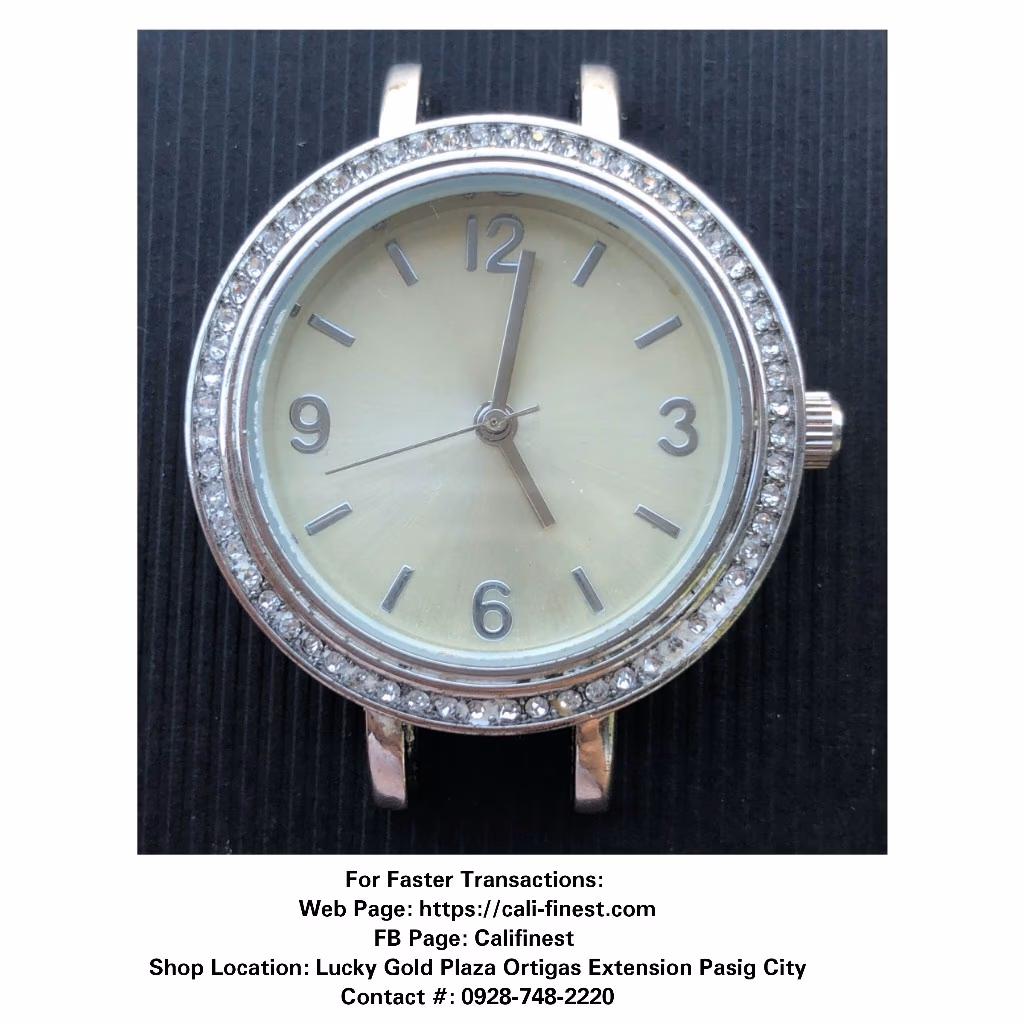 Vivani women's silver-tone quartz watch with a crystal-studded bezel. 