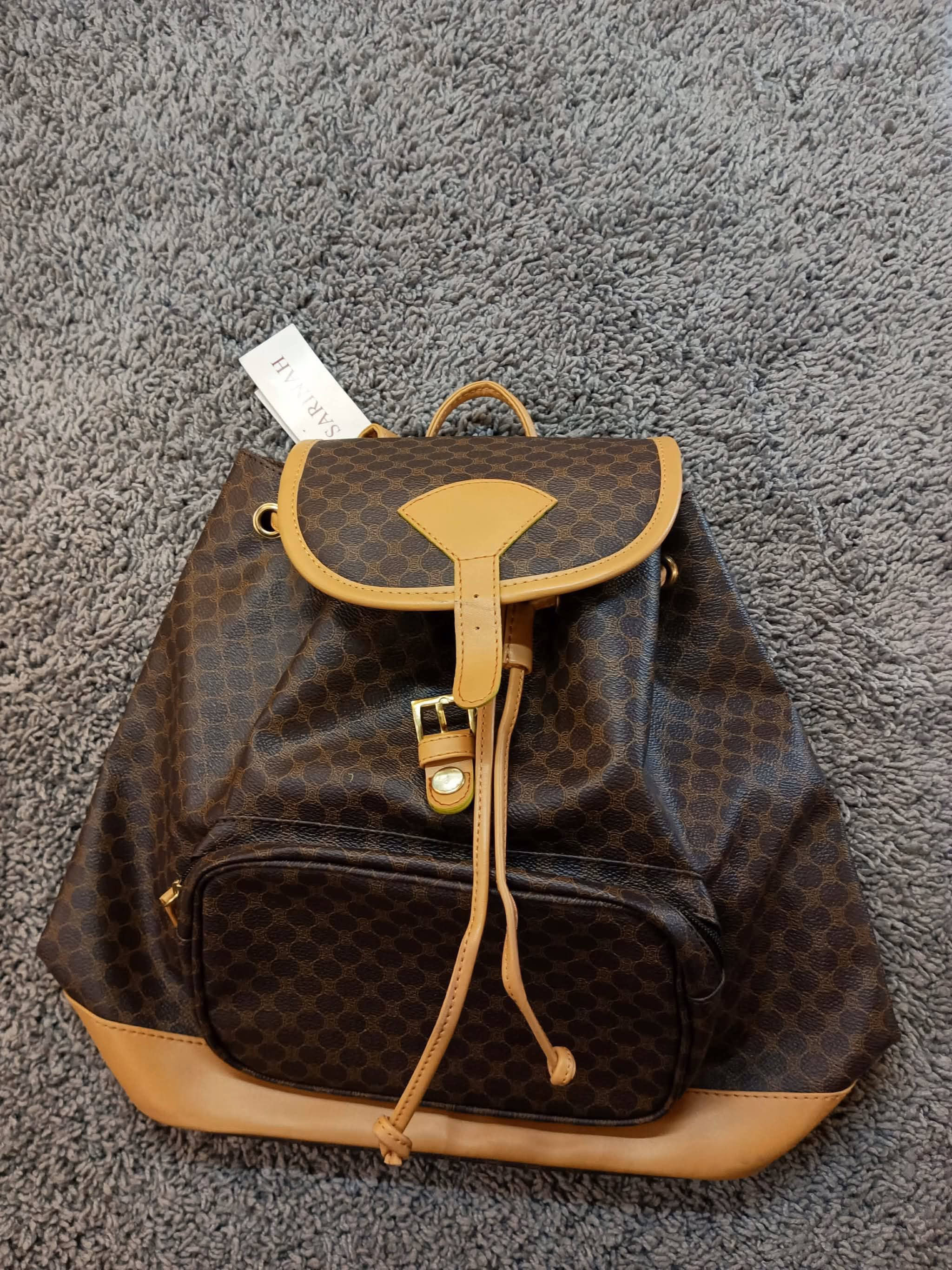 SariNah Monogram Leather Backpack