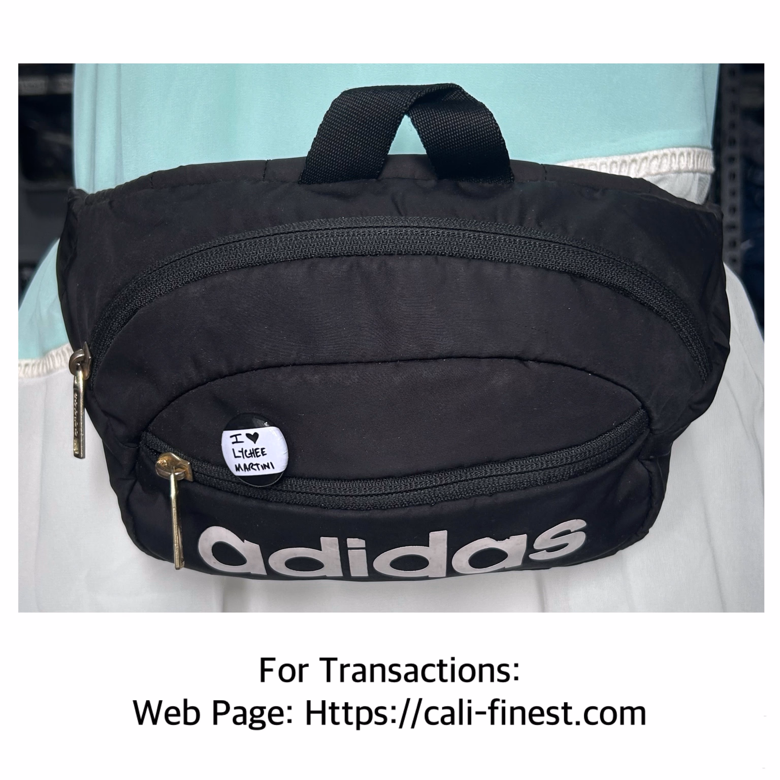 Adisas Originals Core Waist Pack in Black with gold logi and zippers 