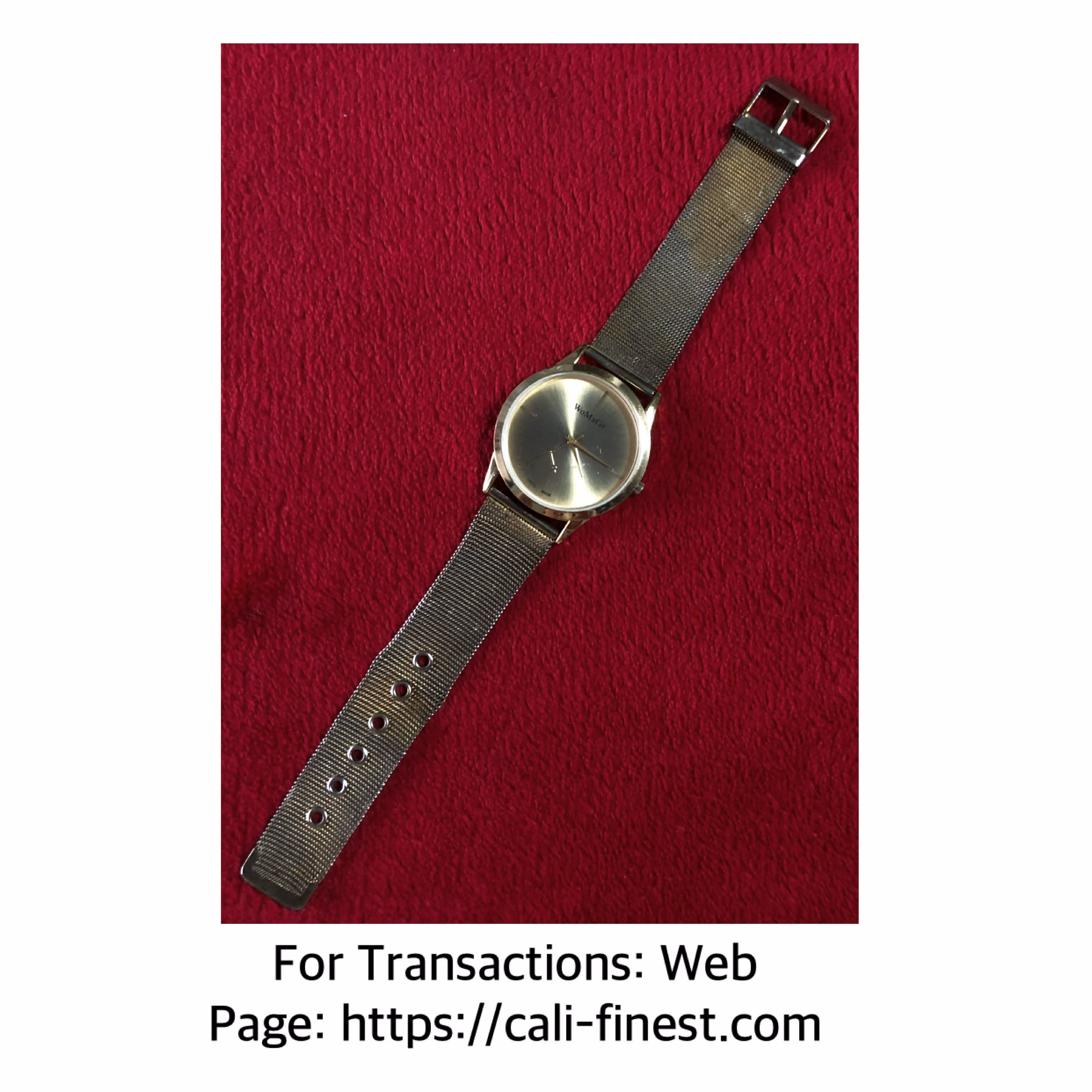 Vintage gold-toned WoMaGe quartz wristwatch features a minimalist dial and durable stainless steel mesh strap 